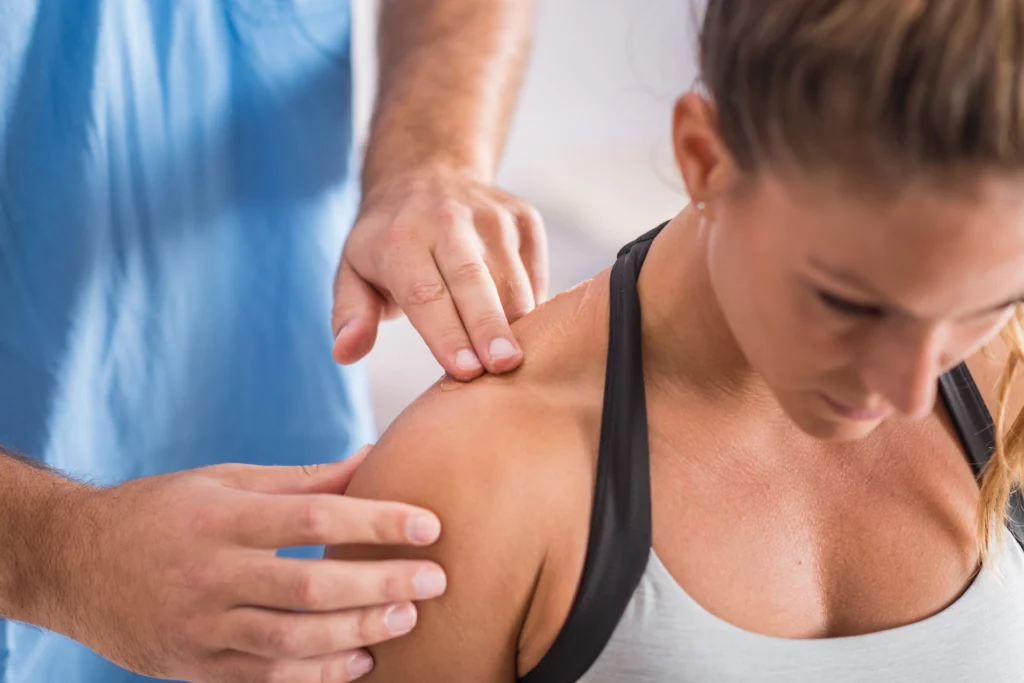 physical therapy therapist addressing trapezius m 2023 11 27 05 25 34 utc