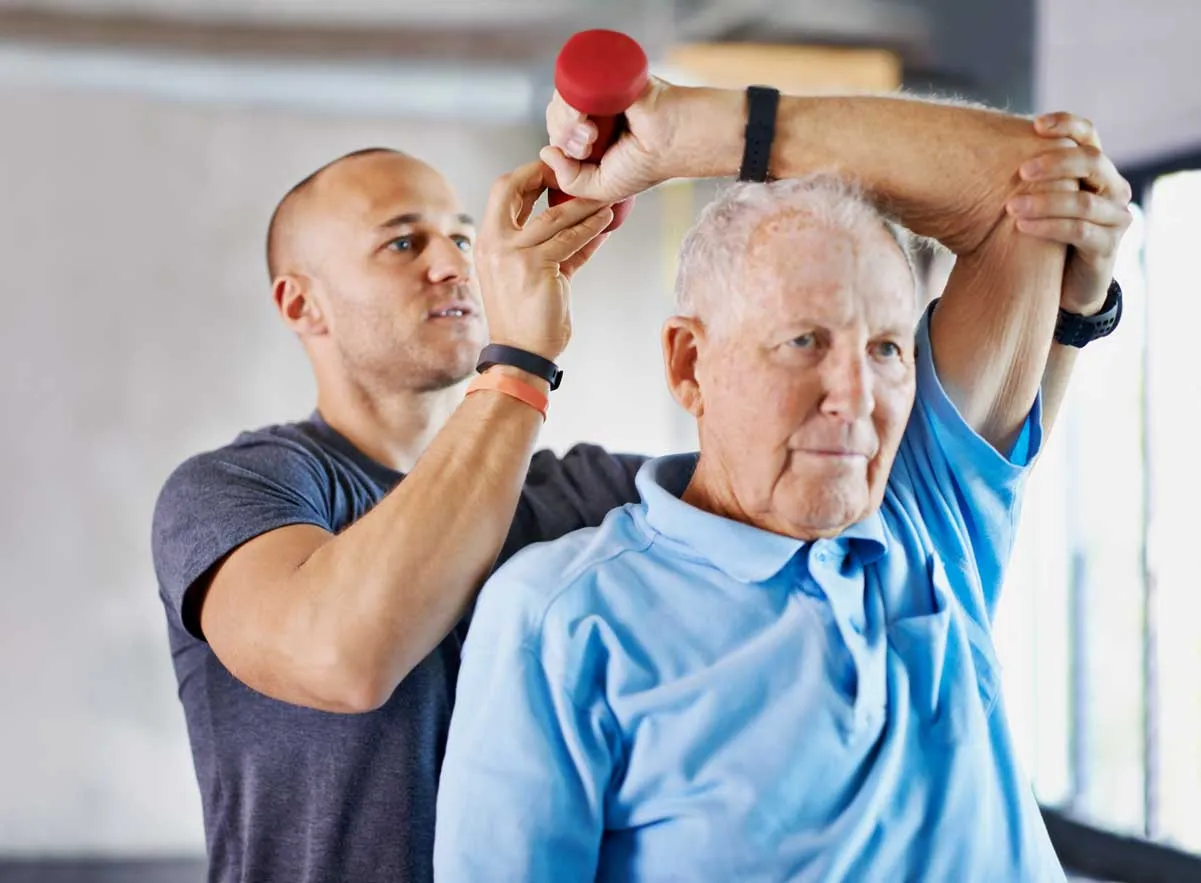 shot of a physiotherapist helping a senior man wit 2023 11 27 04 56 03 utc