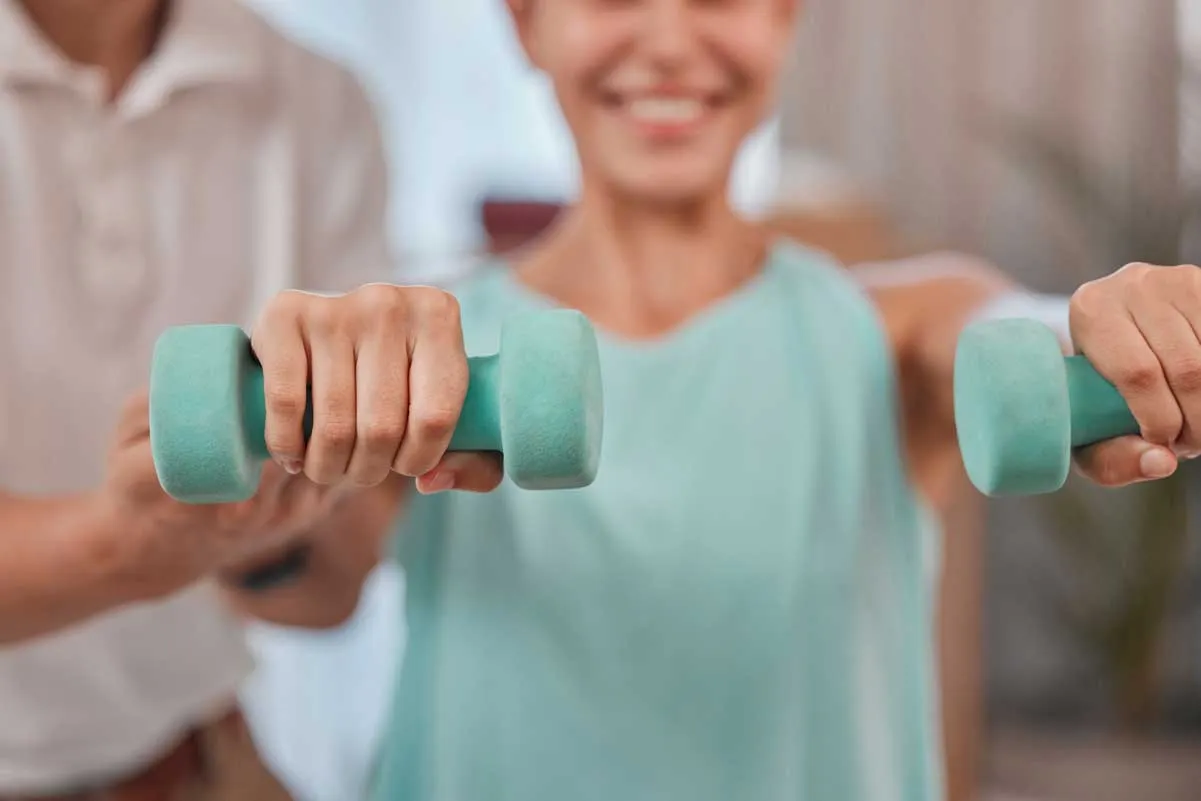 woman hands or dumbbell exercise in physiotherapy 2023 11 27 05 35 21 utc